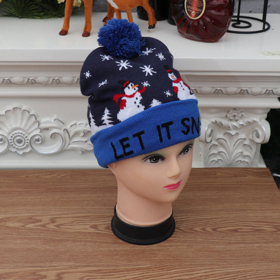 Färgglad lysande stickad julhatt