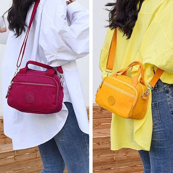 Handväska med flera fack