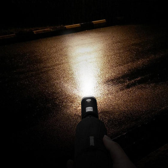 Automatiskt fällbart paraply med reflekterande rand