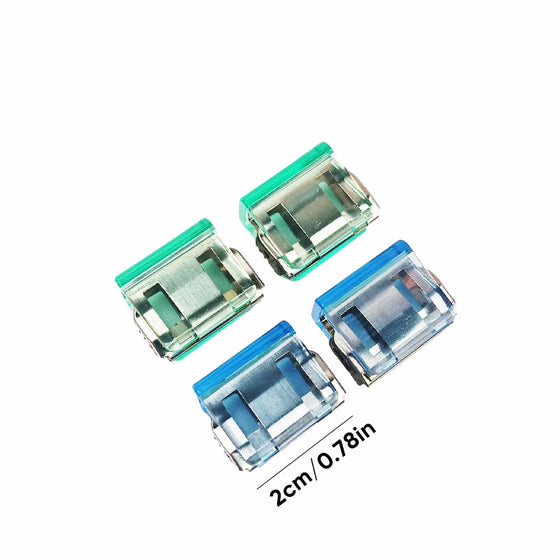 Färgglada små pappersklämmor