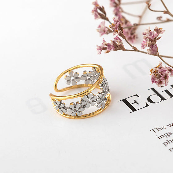 Oregelbunden ihålig tusensköna ring