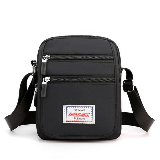 Vattentät lätt axelväska i nylon med stor kapacitet