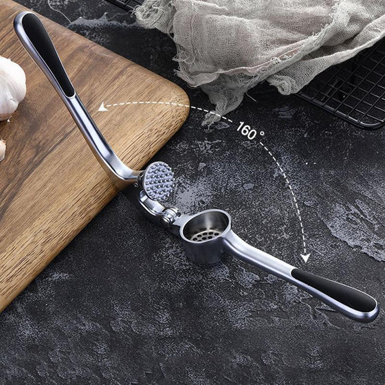 Vitlökspress med ergonomiskt handtag