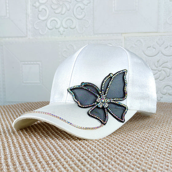 Basebollkeps med fjärilsljus strass