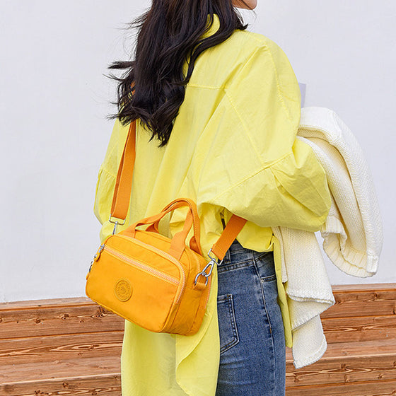 Handväska med flera fack