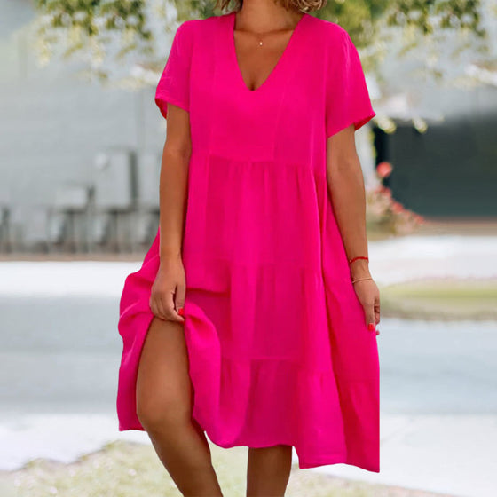 V-ringad enfärgad klänning