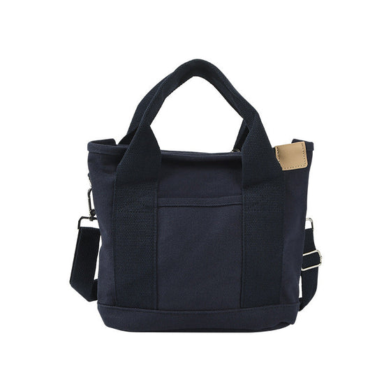 Handväska med flera fickor