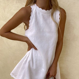 Ärmlös lös spetsklänning