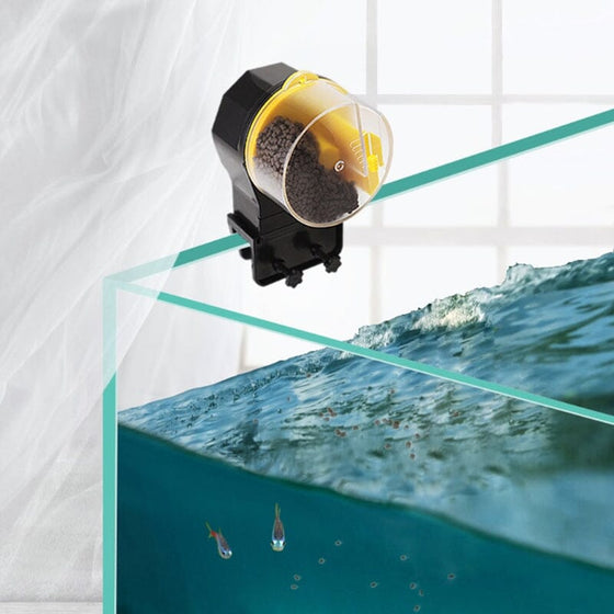 Fisktank timer matare för semester och helg