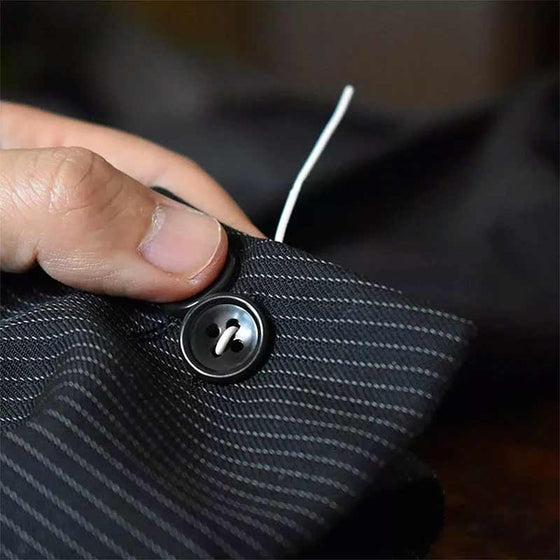 Knappfixeringsverktyg