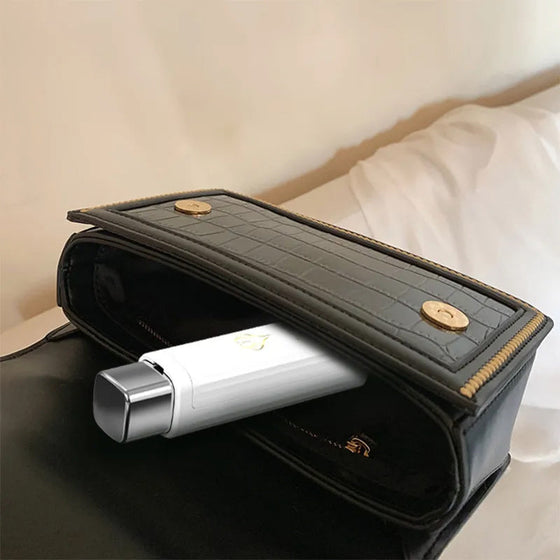 Bärbar tandtrådsdispenser