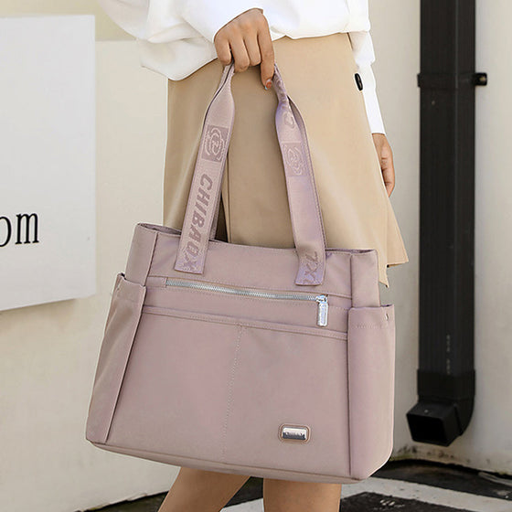 Lätt matchande vattentät axelväska