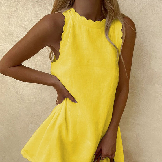 Ärmlös lös spetsklänning