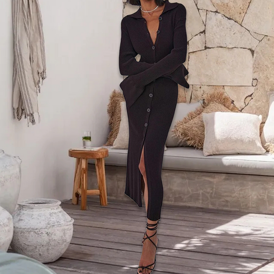 Modestickad klänning med utsvängningsärm