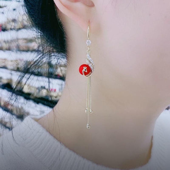 Eleganta påfågelörhängen (2 färger)