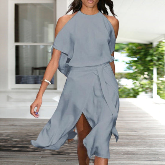 Enfärgad midiklänning med kall axel