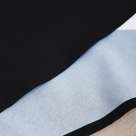 Sjöman randig svart och vit midiklänning med sidficka