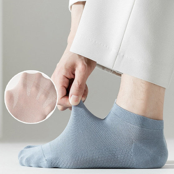 Herrstrumpor i andningsbart material för att motverka dålig lukt