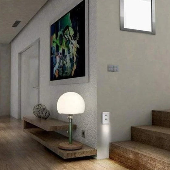 Uttagsväggplatta med LED-nattljus