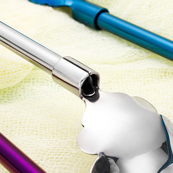 Blomformad sugrör med sked