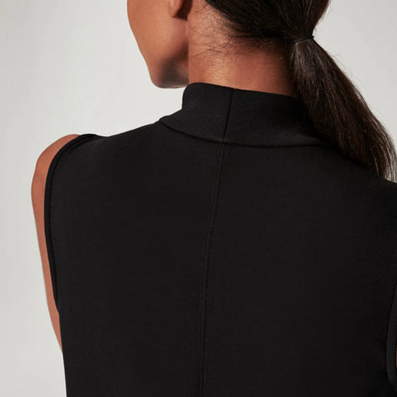 Ärmlös klänning med fickor