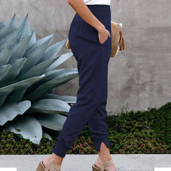 Träningsbyxor med hög midja och fickor