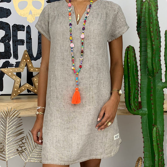 V-ringad klänning i bomull och linne