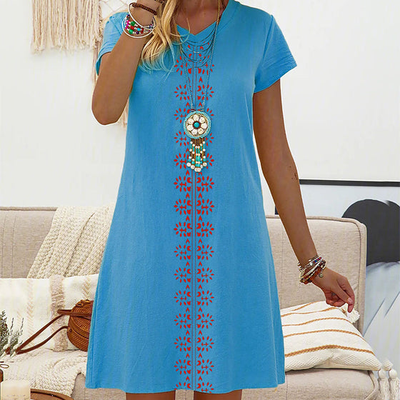 V-ringad kortärmad klänning med tryck