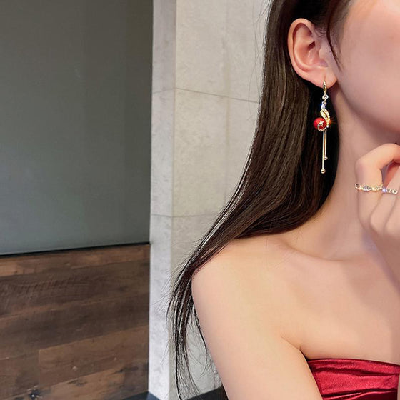 Eleganta påfågelörhängen (2 färger)