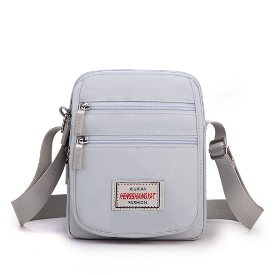 Vattentät lätt axelväska i nylon med stor kapacitet