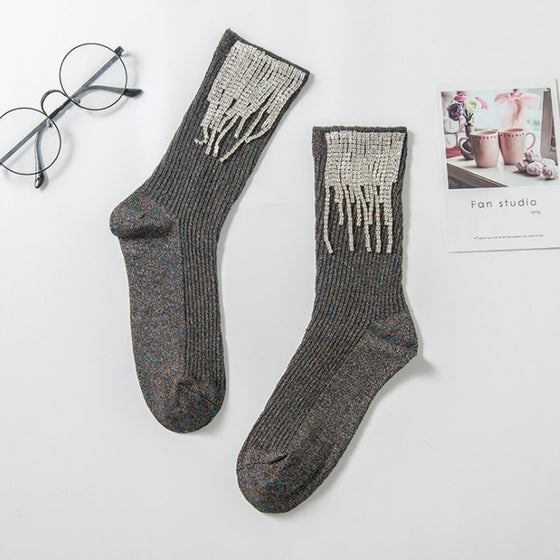 Damstrumpor med tofsar