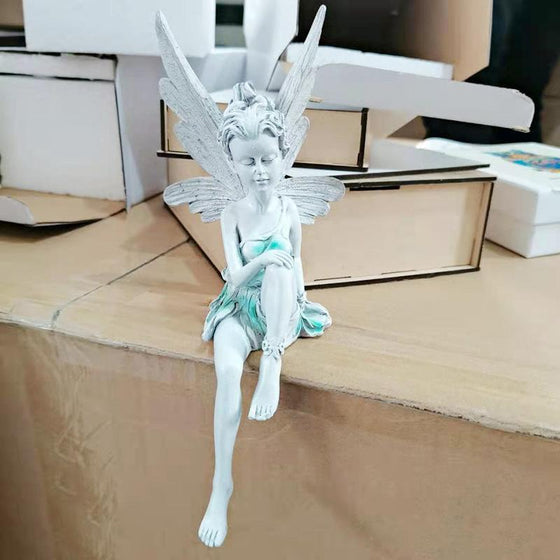 Sittande Älva skulptur | trädgårdsdekoration