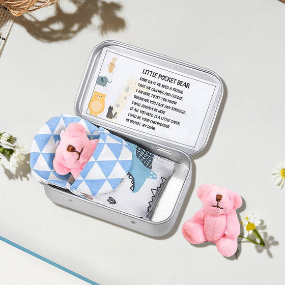 Nallebjörn i en plåtlåda