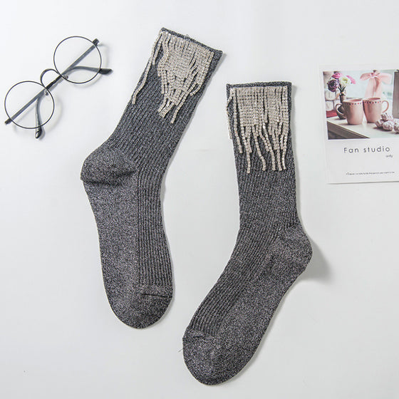 Damstrumpor med tofsar