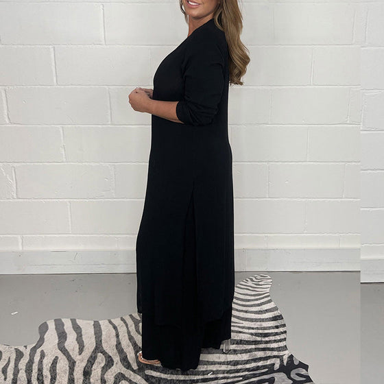 Casual tvådelad kostym med lång topp och matchande byxa