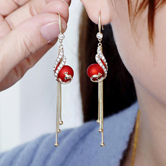 Eleganta påfågelörhängen (2 färger)