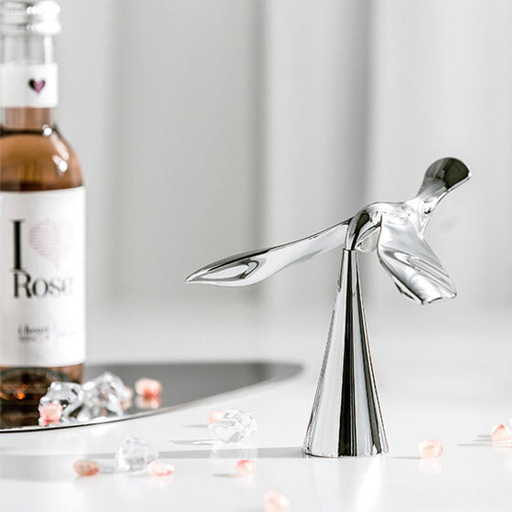 Flasköppnare med flygande fåglar