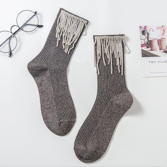 Damstrumpor med tofsar