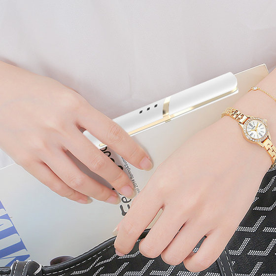 Elektrisk uppvärmd ögonfransböjare