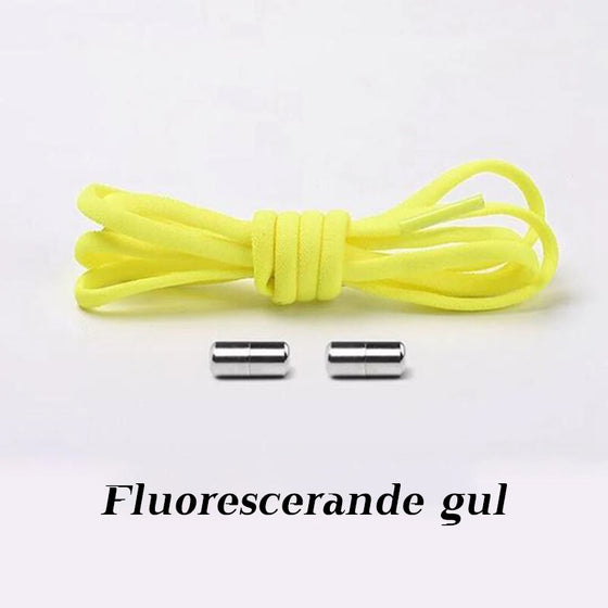 Inga knytskosnören med metallkapsel