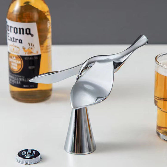 Flasköppnare med flygande fåglar