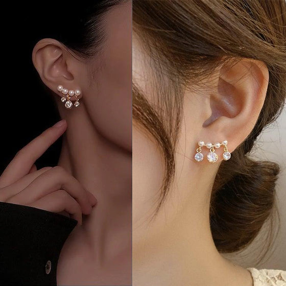 Böjda pärltofs korta örhängen