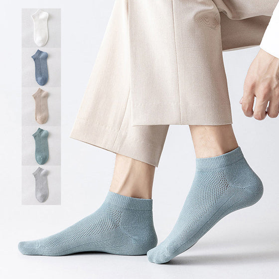Herrstrumpor i andningsbart material för att motverka dålig lukt