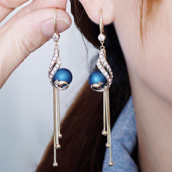 Eleganta påfågelörhängen (2 färger)