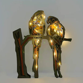 Djurprydnad i snidat trä (med ljus)