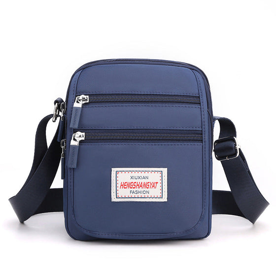 Vattentät lätt axelväska i nylon med stor kapacitet