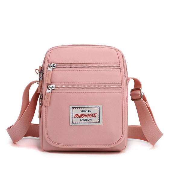 Vattentät lätt axelväska i nylon med stor kapacitet