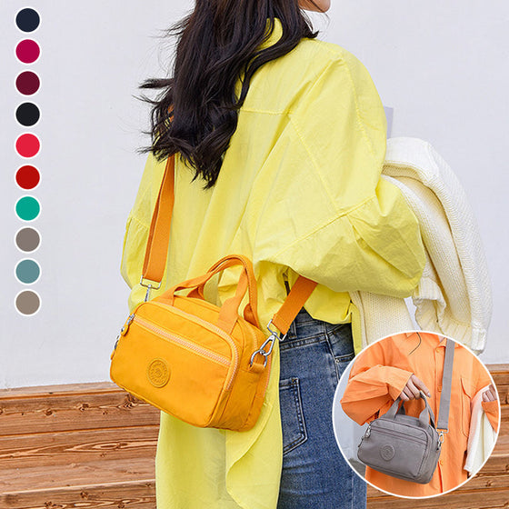 Handväska med flera fack