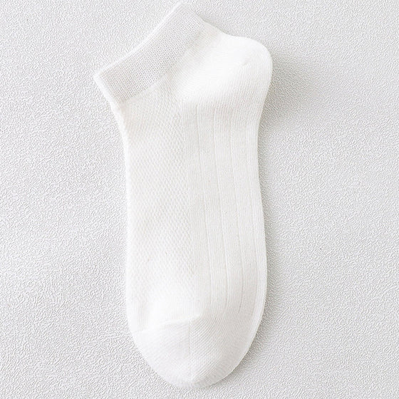 Herrstrumpor i andningsbart material för att motverka dålig lukt