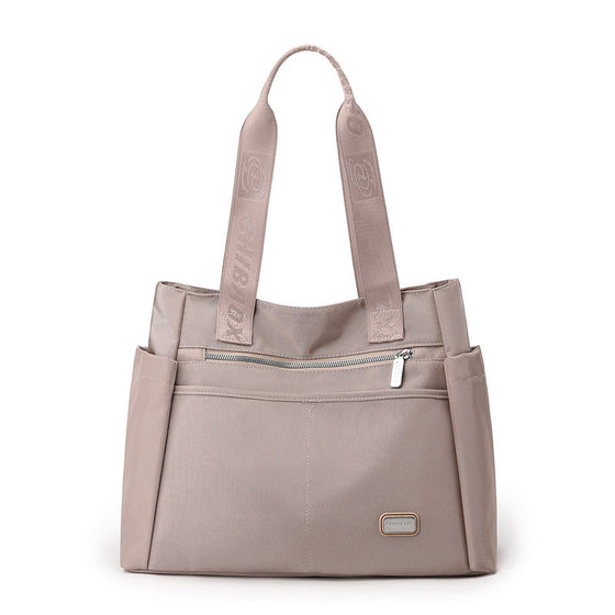 Lätt matchande vattentät axelväska